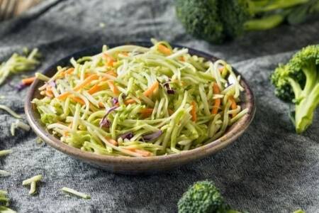A fresh slaw made of broccoli, carrots and red cabbage.